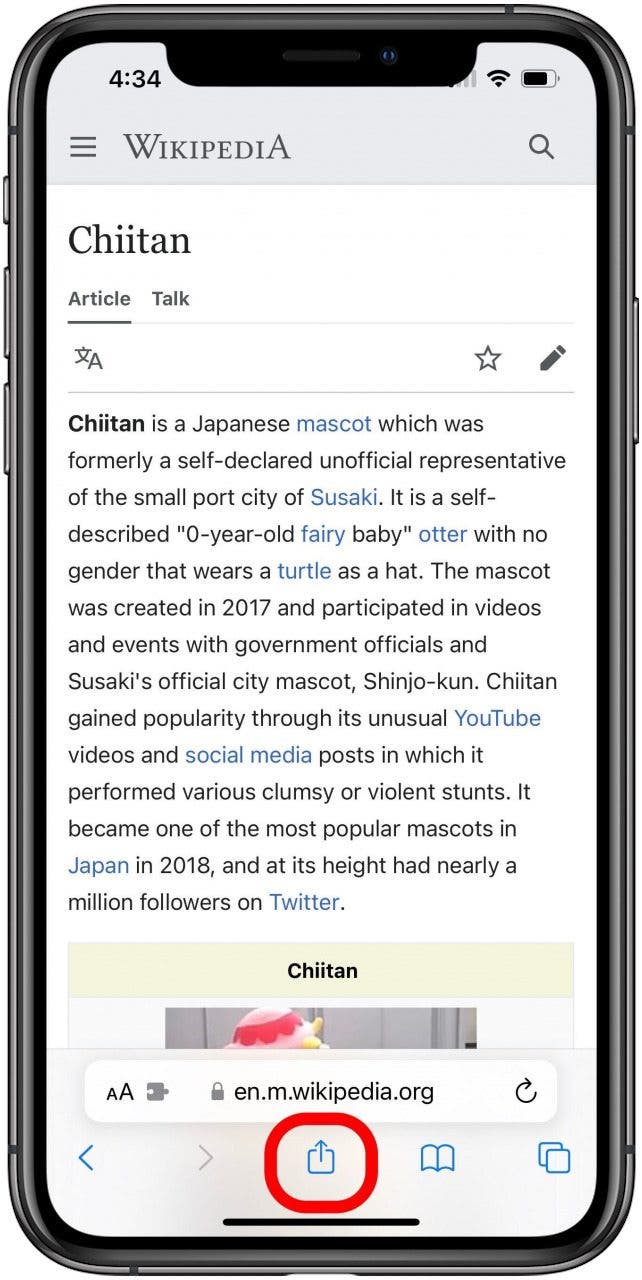 Safari con un artículo de Wikipedia abierto y el botón Compartir marcado.