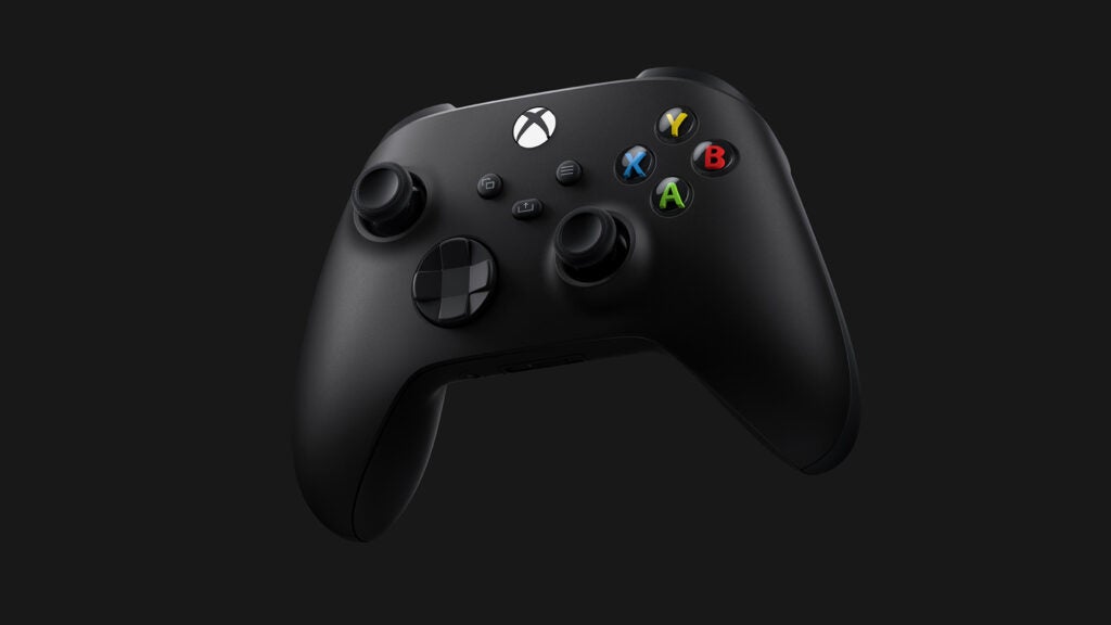 Un controlador Xbox serie X negro flotando sobre fondo negro