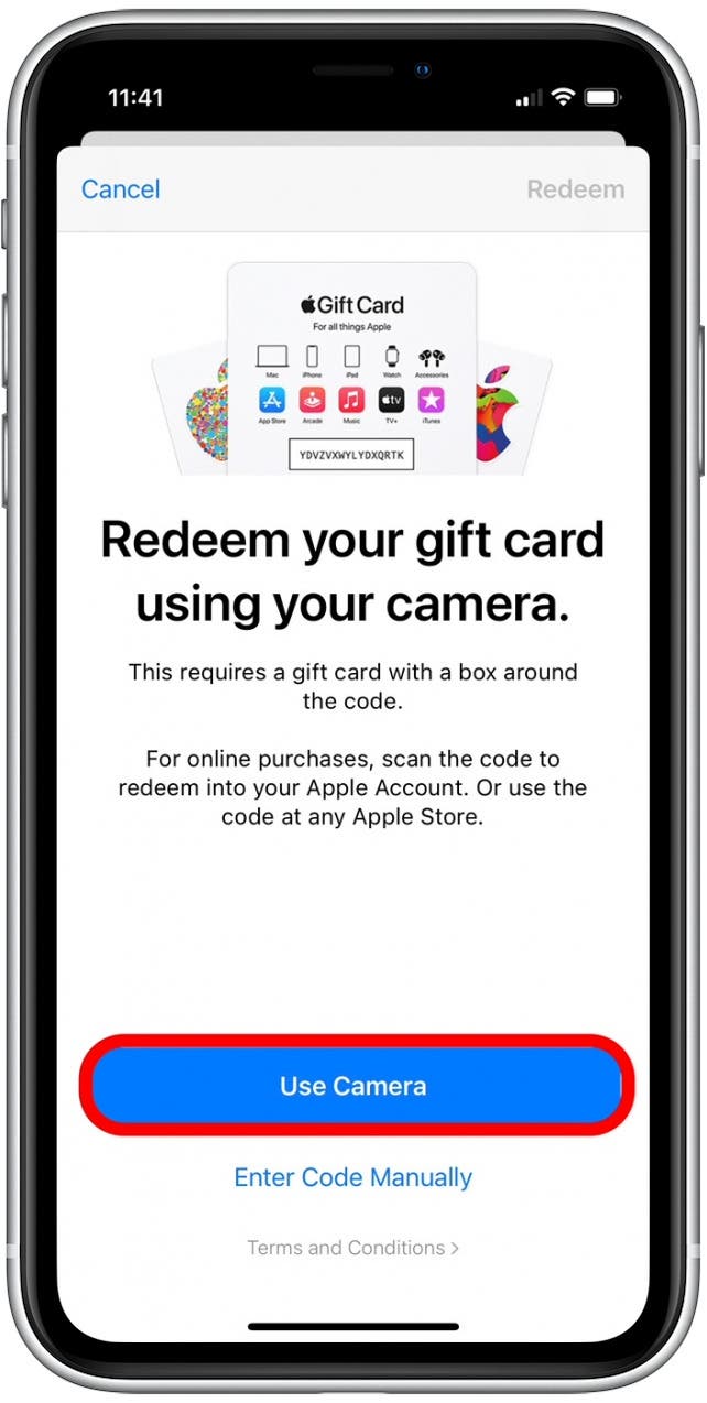 Toque Usar cámara para canjear la tarjeta de regalo de iTunes con compartir en familia.  