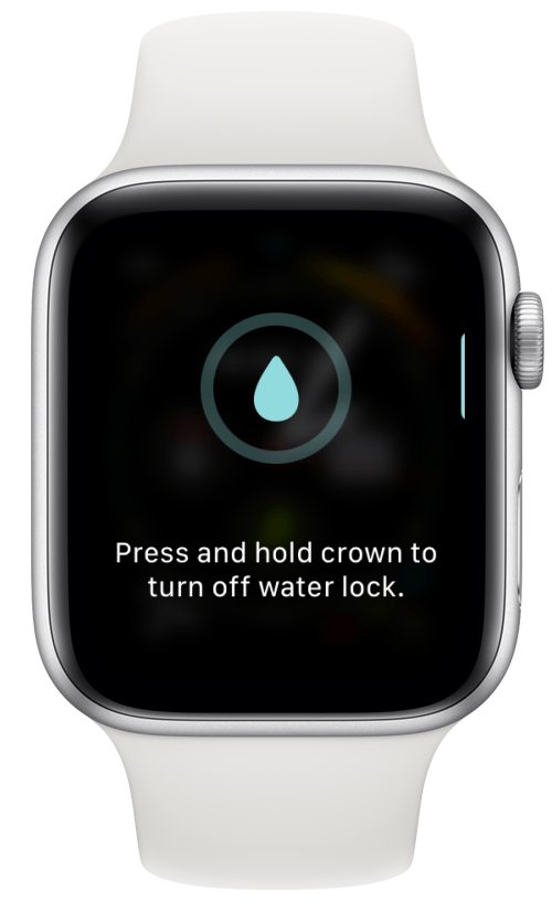 Mantenga presionado el botón de la corona digital hasta que el reloj expulse el agua. 