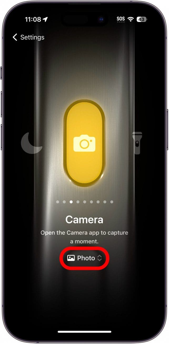 Configuración del botón de acción del iPhone que muestra la configuración de la cámara con Fotos en un círculo rojo.