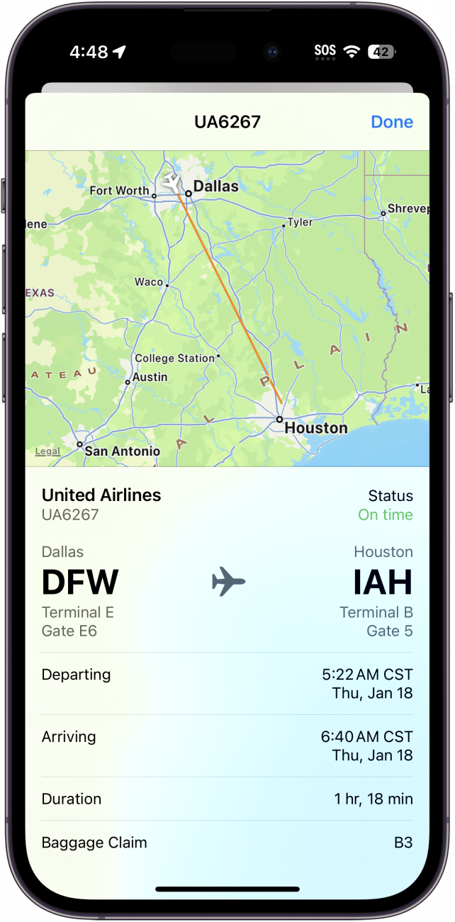 Ventana de detalles de vuelo del iPhone que muestra información de un vuelo de Dallas Fort Worth a Houston