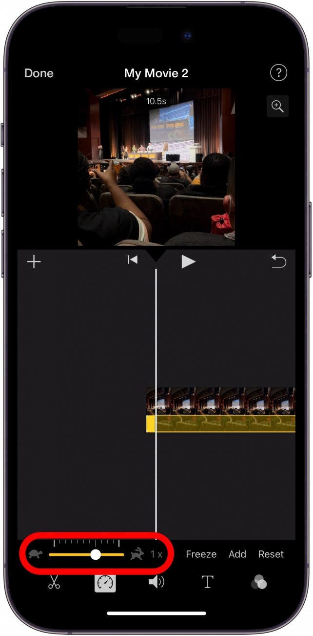 Aplicación Imovie para iPhone con control deslizante de velocidad de reproducción con un círculo rojo