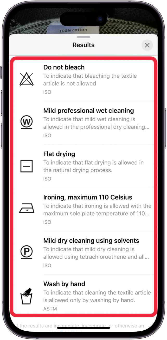 aplicación de fotos para iPhone con el menú de búsqueda visual ampliado abierto, que muestra diferentes símbolos de lavandería y sus significados con un cuadro rojo rodeándolos